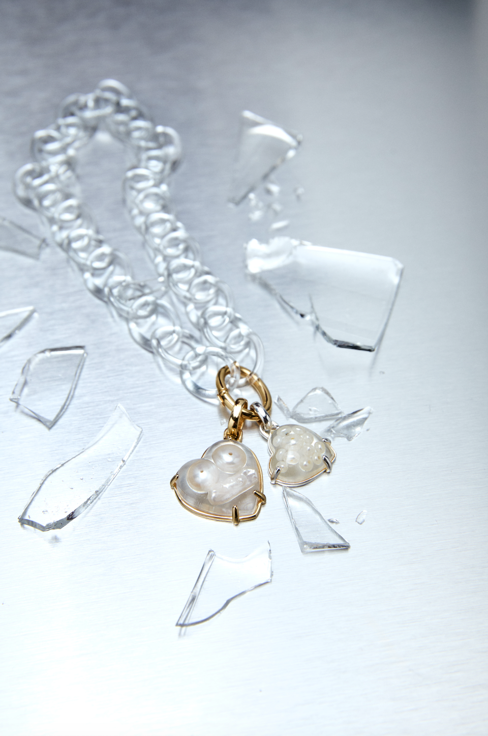 CORAZÓN DE PERLAS ENCAPSULADAS EN PLATA DE LEY