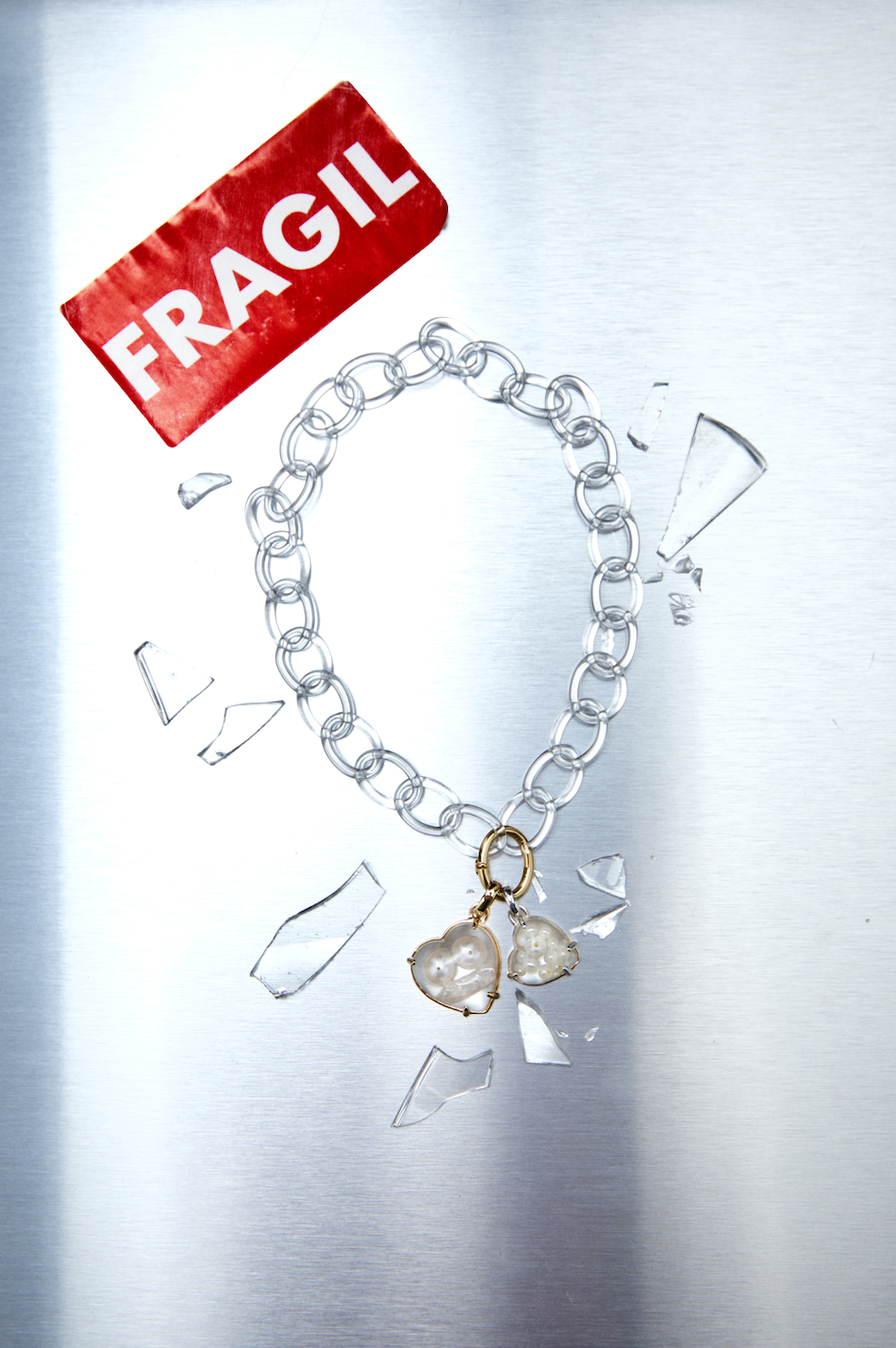 CORAZÓN DE PERLAS ENCAPSULADAS EN PLATA DE LEY